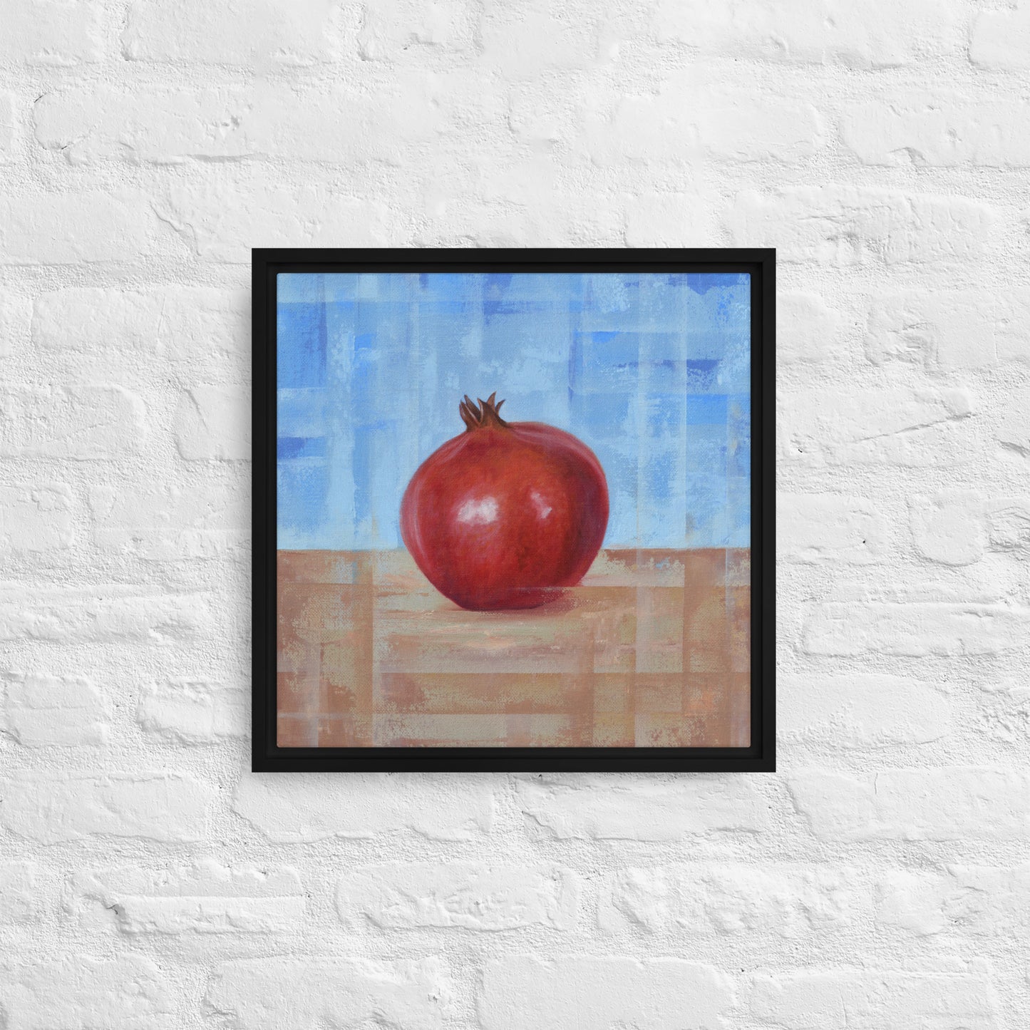 Fruit Painting by artist Shawn Dixon shown a framed canvas pomegranate print with a black frame